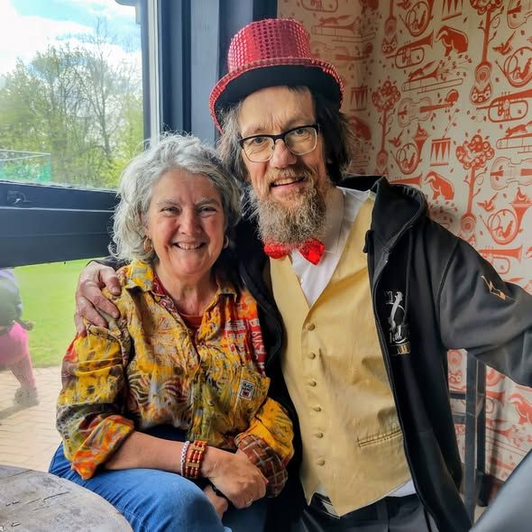Picture of me and the songwriter Louise Cooke. I am wearing my sparkly red top hat and sparkly red bow tie.